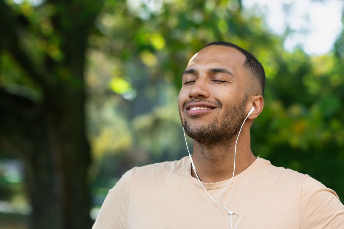 Nose-Loss-of-Smell man enjoying a walk and listening to music